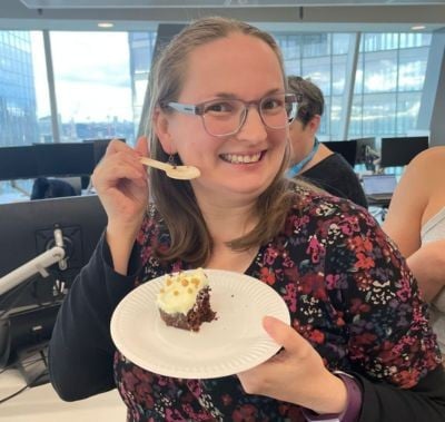 Employee eating birthday cake